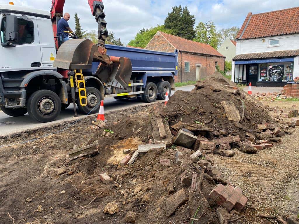 This is a photo of a dig out being carried out for the installation of a new tarmac driveway. Works being carried out by Hawkhurst Driveways