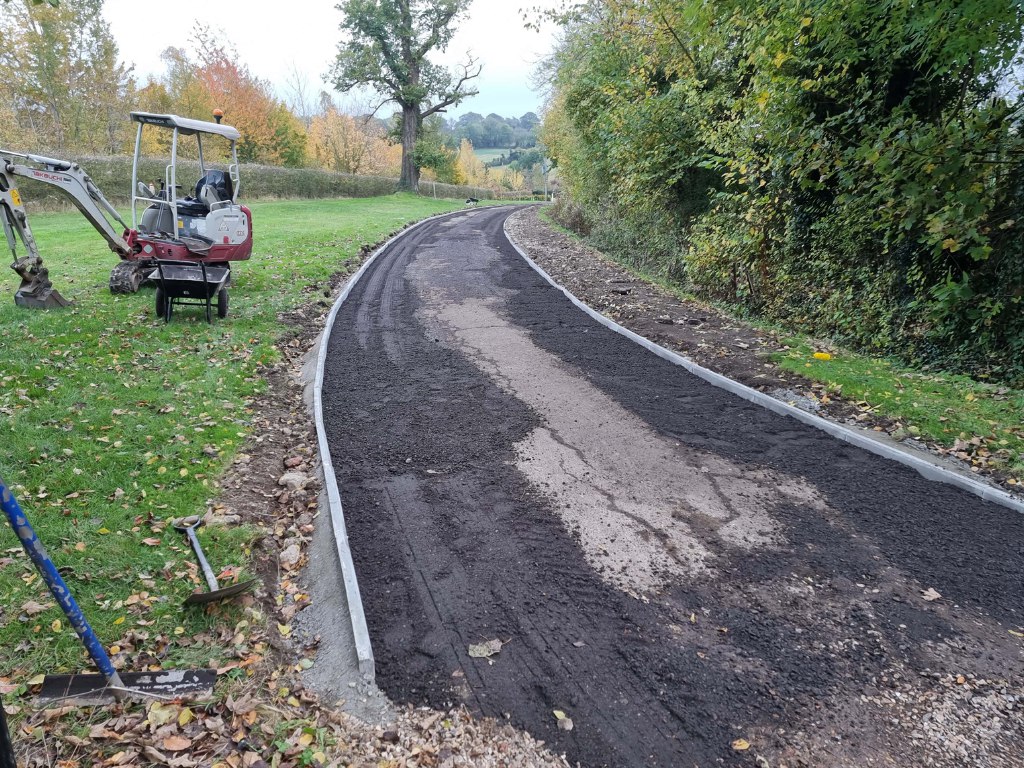 This is a large driveway which is in the process of having a tar and chip driveway installed on by Hawkhurst Driveways